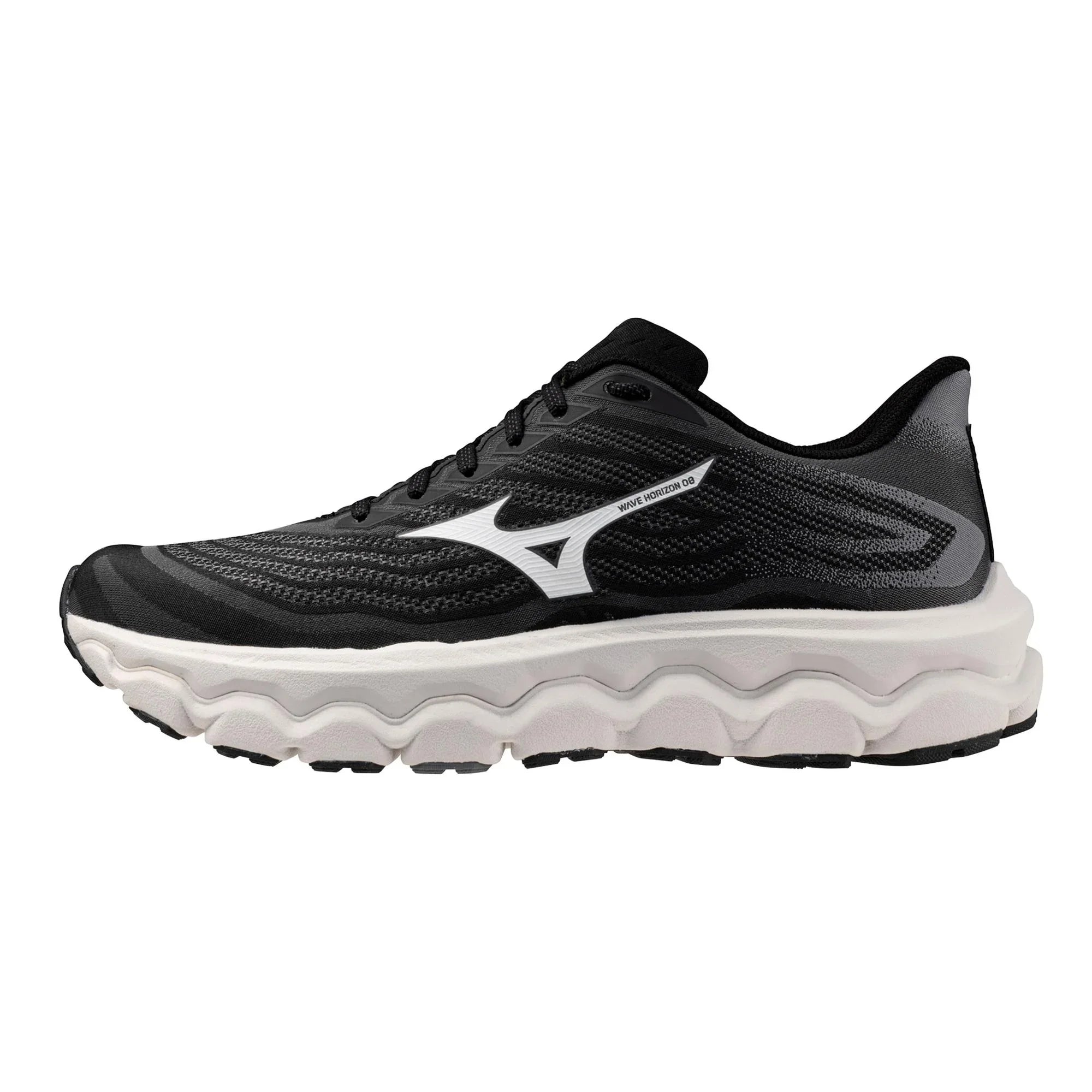 Black and white athletic running shoe with thick cushioned sole on white background