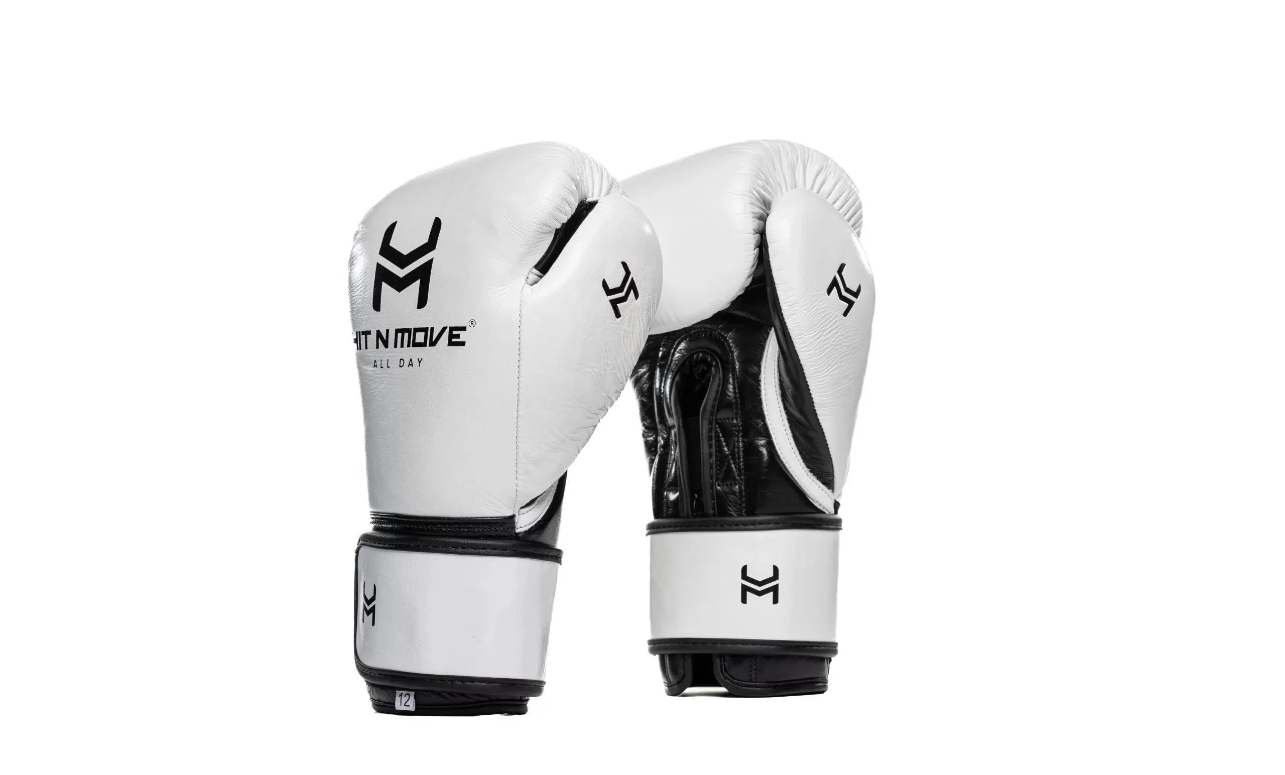 White and black leather boxing gloves with "HIT N MOVE ALL DAY" logo, standing upright on white background.