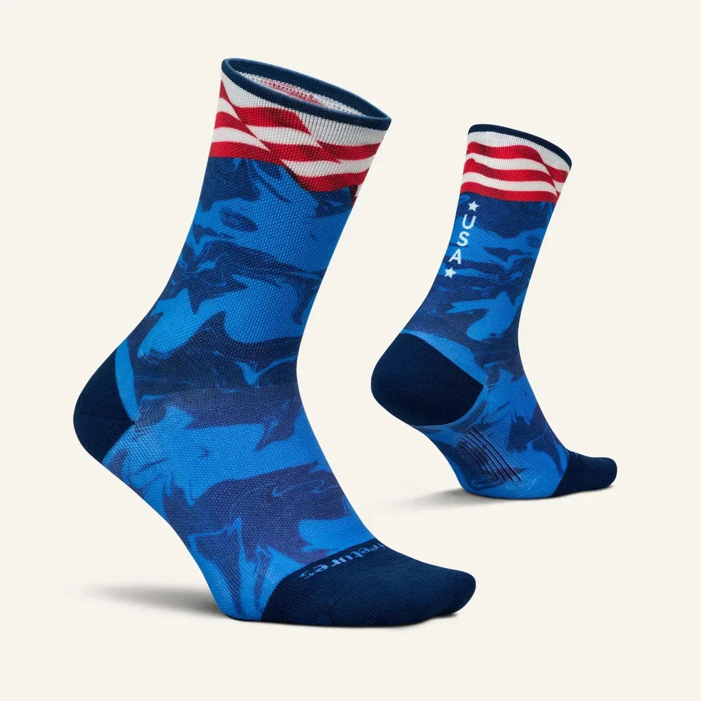 Blue athletic socks with USA text, stars, and American flag design, ideal for boxing training.