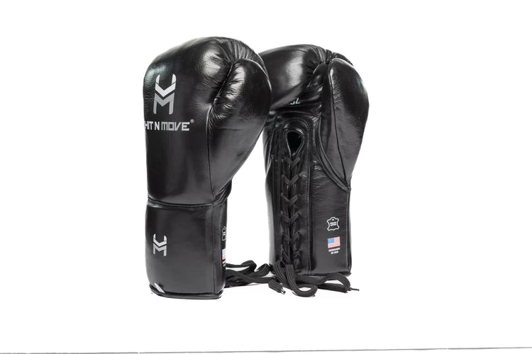 Black leather lace-up boxing gloves with 'HIT N MOVE' logo, horsehair padding, pro boxing gear