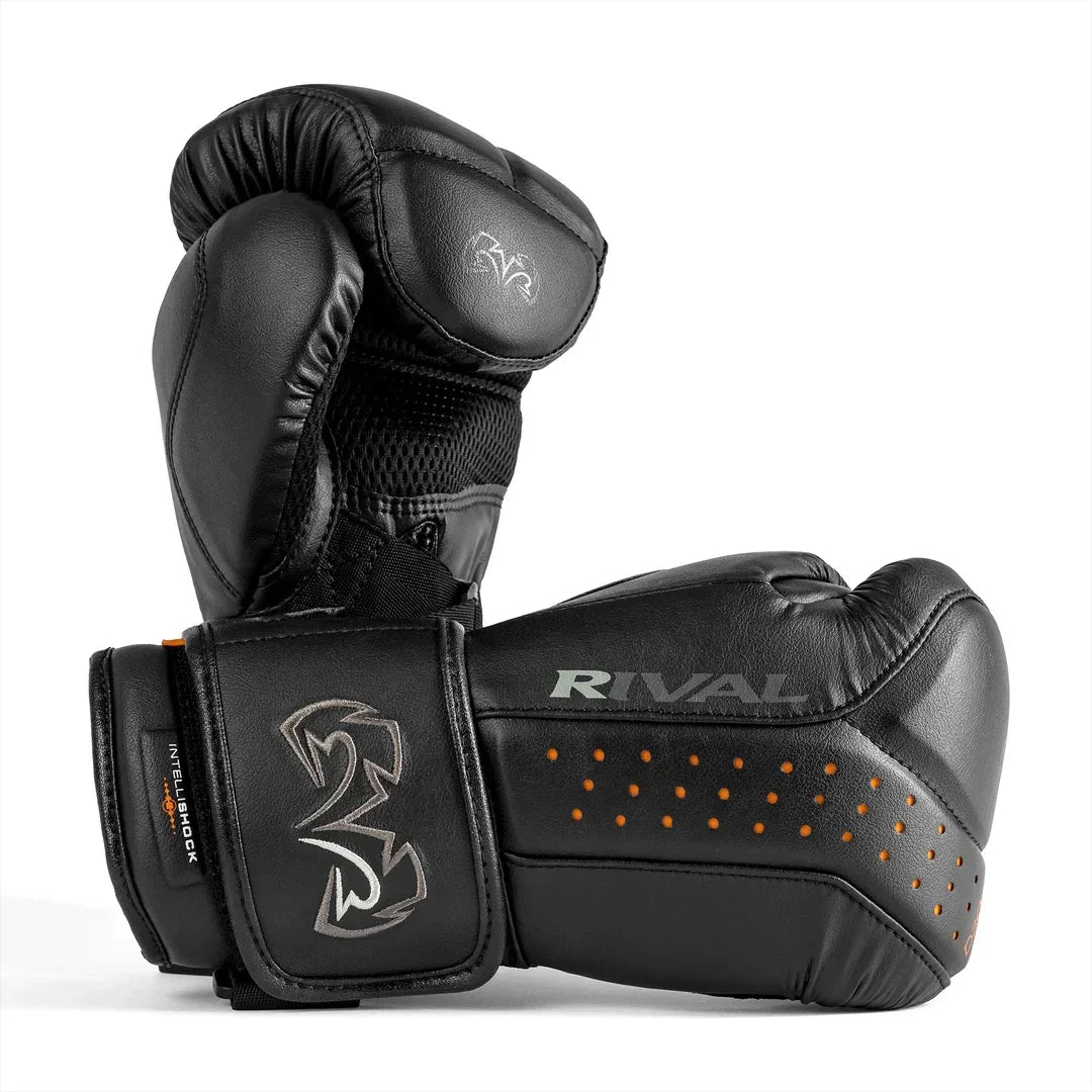Black Rival boxing gloves with orange accents and wrist support on white background
