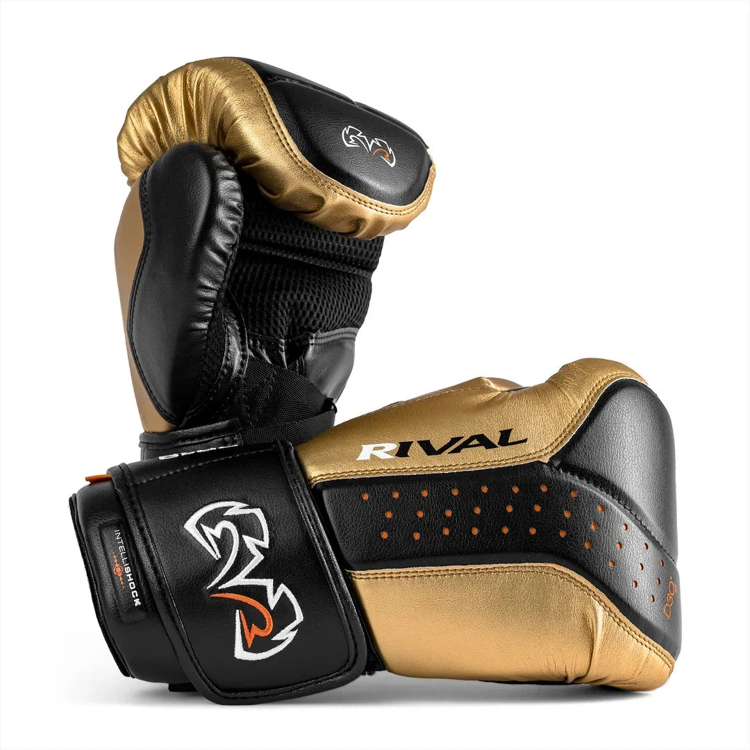 Black and gold Rival boxing gloves with embroidered logo, padded wrist support, white background