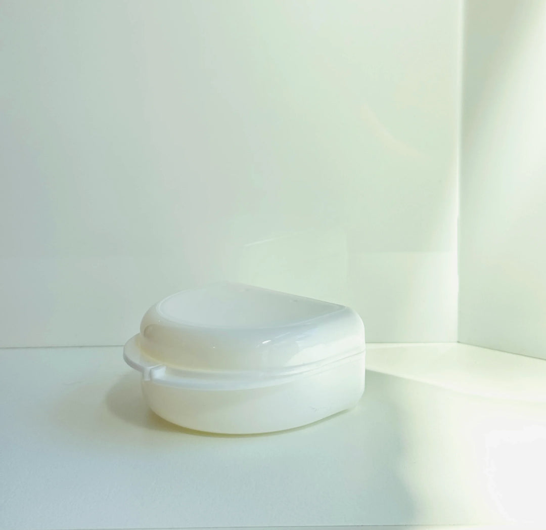 White boxing mouthguard case on plain white background