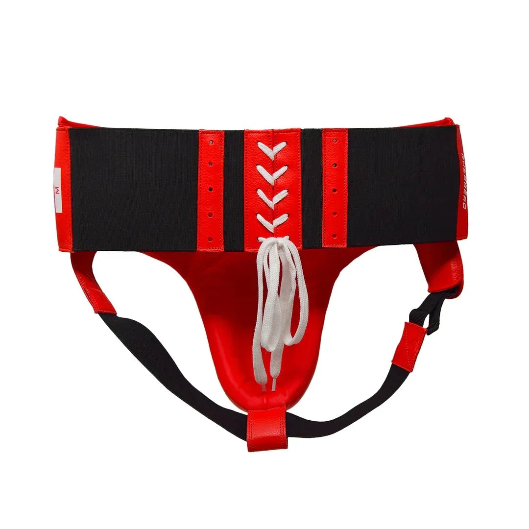 Red and black boxing groin protector with lace-up front and adjustable straps.