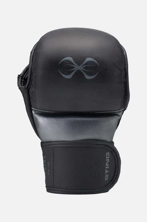 Black MMA sparring glove with padded knuckles, adjustable wrist strap, and silver accent