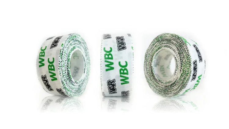 Three rolls of white boxing hand wrap tape with WBC and WAR logos on a white background.