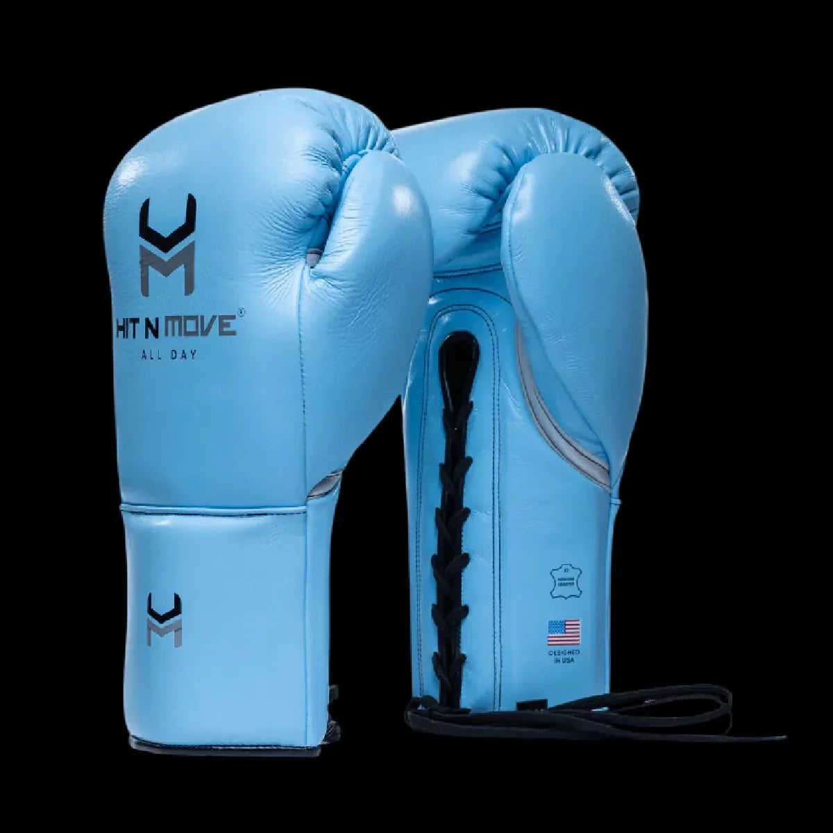 Light blue leather boxing gloves with laces, pro-grade, on black background