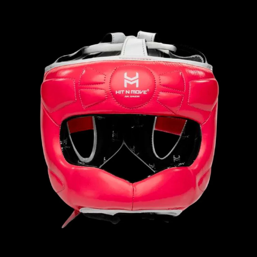 Red boxing headgear with open face and 'Hit N Move' logo on black background