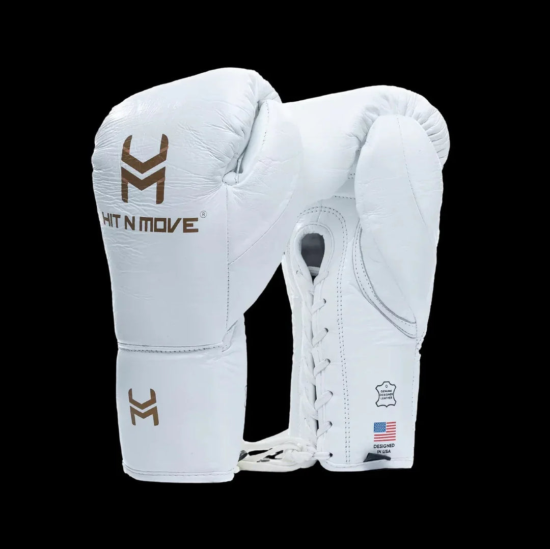 White lace-up Hit N Move boxing gloves with leather logo and USA flag on black background.