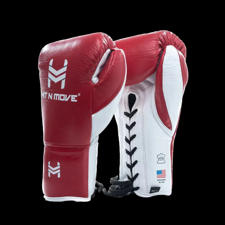 Red and white lace-up leather boxing gloves with branding on black background