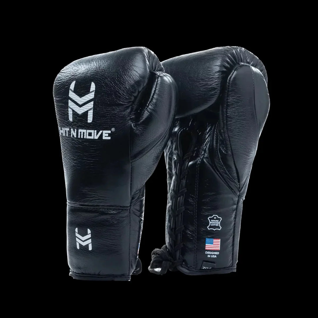 Black leather boxing gloves with lace-up closure and Hit N Move branding on black background