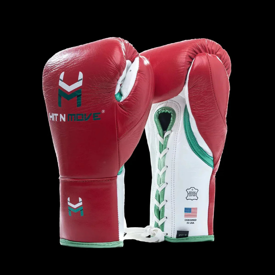 Red and white lace-up boxing gloves with green accents, pro-grade leather, on black background