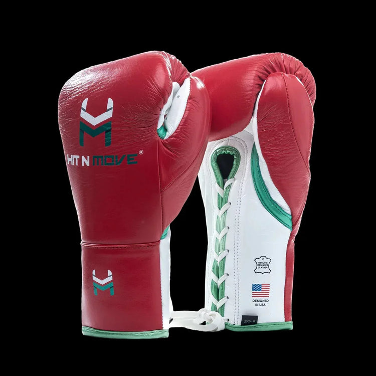 Red and white lace-up boxing gloves with green accents, pro-grade leather, on black background