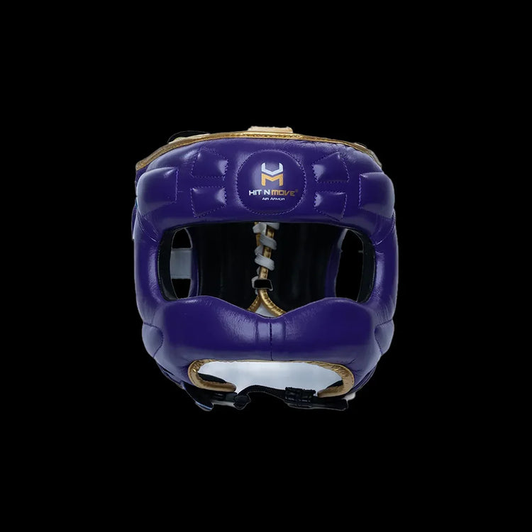 Purple leather boxing headgear with gold trim and Hit N Move logo, front view, on black background