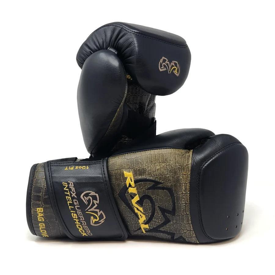 Black and gold boxing gloves with crocodile pattern and Rival logo, pro training gear