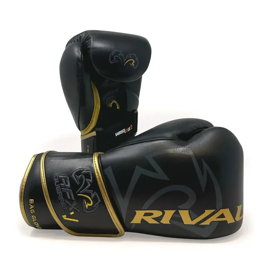 Black and gold boxing gloves with Rival logo, pro-grade training equipment on white background.