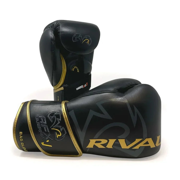 Black and gold boxing gloves with Rival logo, pro-grade training equipment on white background.