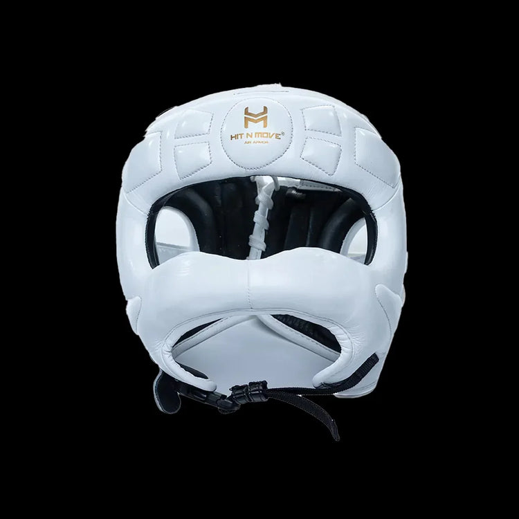 White boxing headgear with face protection and HIT N MOVE logo on front, black background